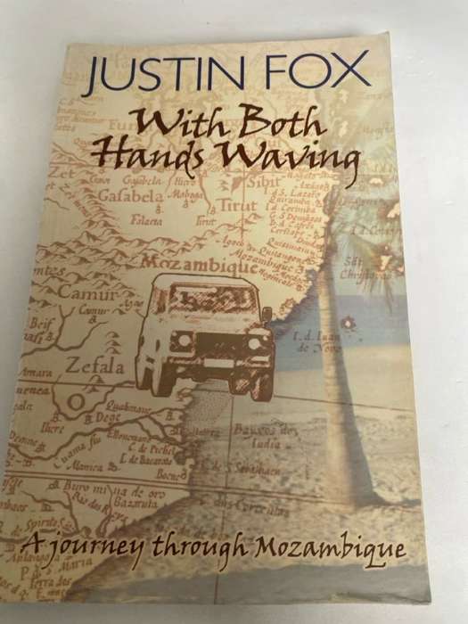 With both hands waving, a journey through Mozambique - Justin Fox
