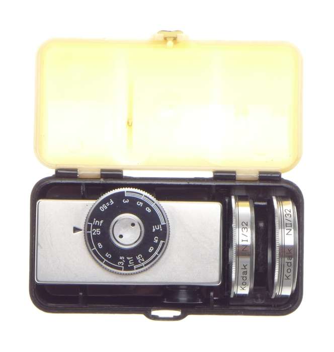 Cased Kodak universal hot shoe camera rangefinder with lenses