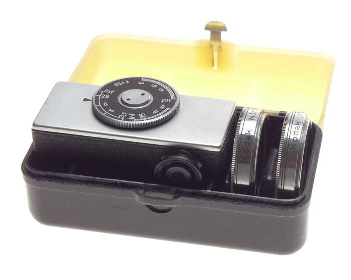 Cased Kodak universal hot shoe camera rangefinder with lenses