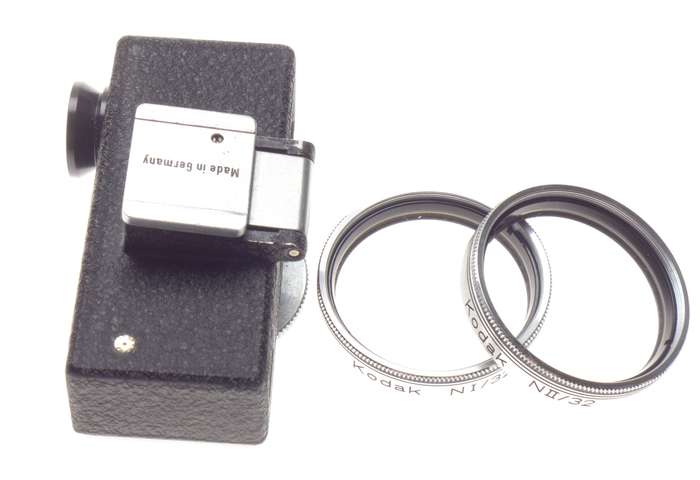 Cased Kodak universal hot shoe camera rangefinder with lenses