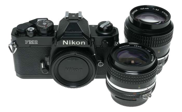 Nikon FM2 Black SLR Camera 1:3.5/28 Nikkor 1:2.5/105 Lenses Caps Filters