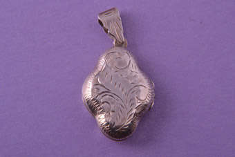 Silver Modern Locket |  |