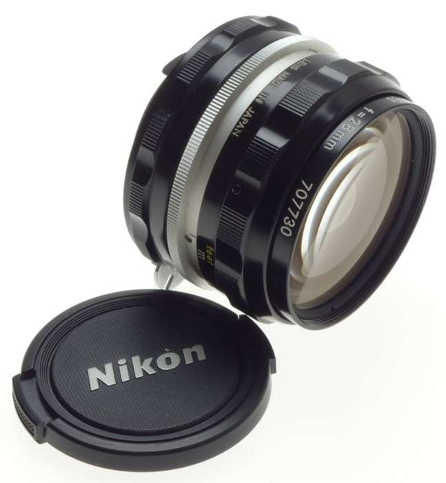 f=28mm NIKKOR-H AUTO 1:3.5 f=2.8cm NIPPON 35mm SLR LENS CAPS KEEPER 3.5/28 BLACK
