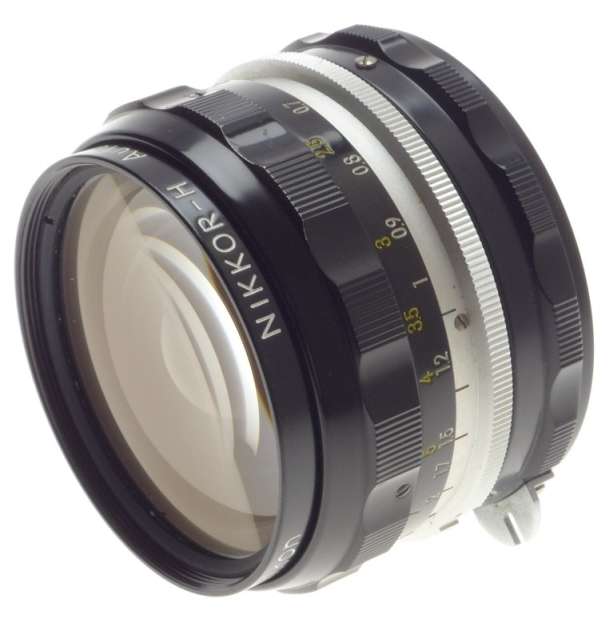 f=28mm NIKKOR-H AUTO 1:3.5 f=2.8cm NIPPON 35mm SLR LENS CAPS KEEPER 3.5/28 BLACK