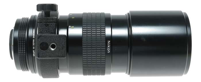 Nikon Nikkor 1:4.5 300mm SLR camera telephoto lens tripod mount