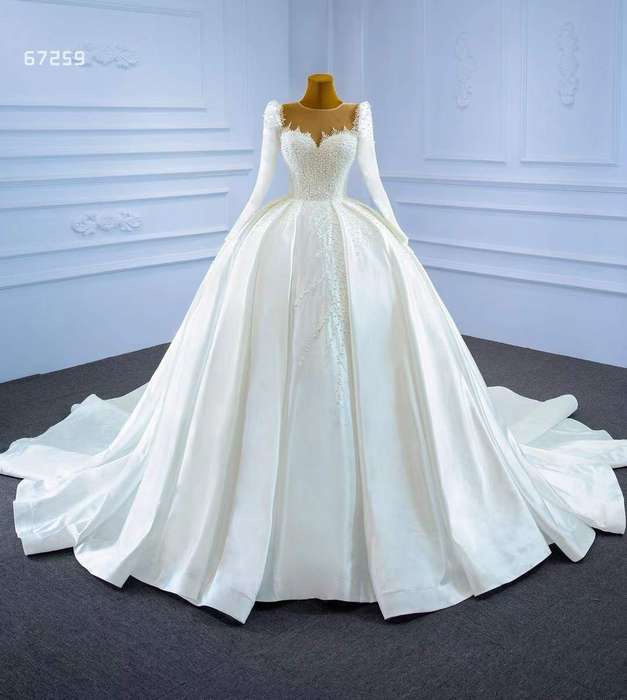 Kourtney, long sleeve pearl detail ballgown wedding dress.