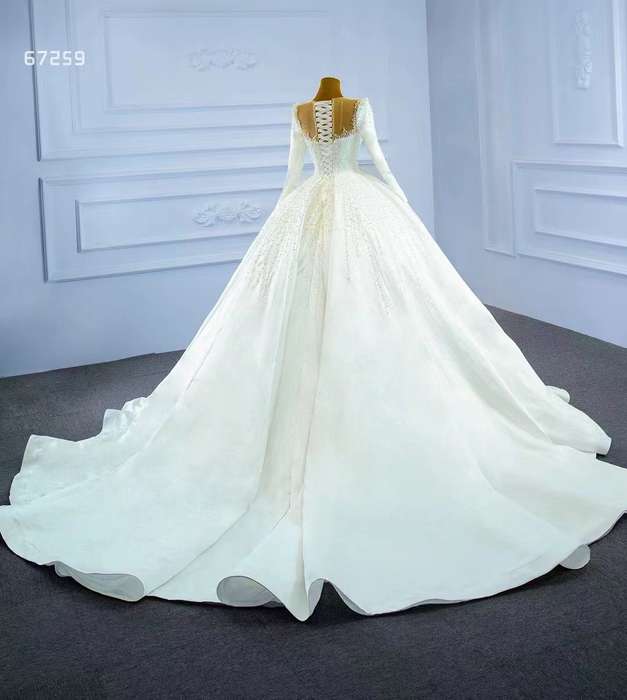 Kourtney, long sleeve pearl detail ballgown wedding dress.