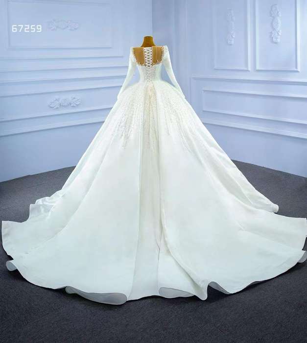 Kourtney, long sleeve pearl detail ballgown wedding dress.