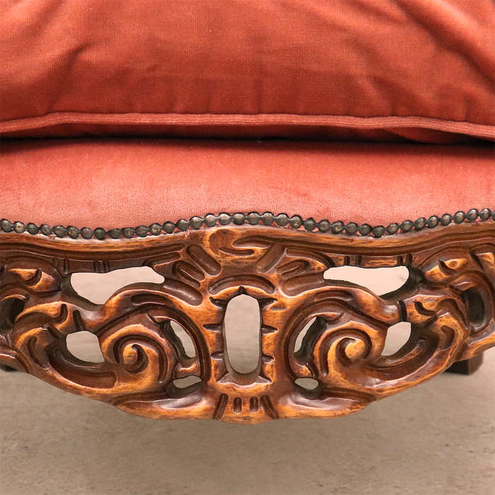 Heavily carved Armchairs