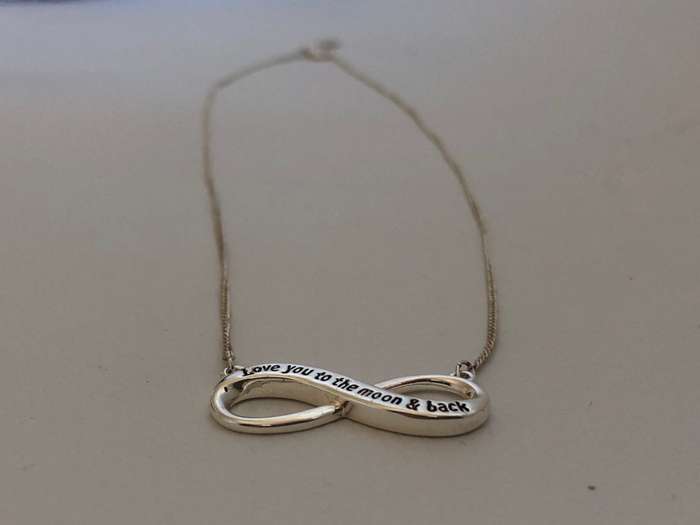 Silver Plated Necklace With Infinity Pendant With "Love you to the moon and back" Inscription. Ma...