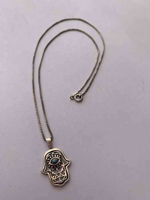 925 Silver Chamsa Pendant on Silver Chain. Chamsa has Blue Stone Inset #ML722 R395.00 | Dimension...