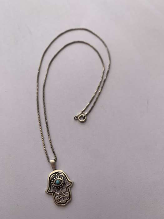925 Silver Chamsa Pendant on Silver Chain. Chamsa has Blue Stone Inset #ML722 R395.00 | Dimension...