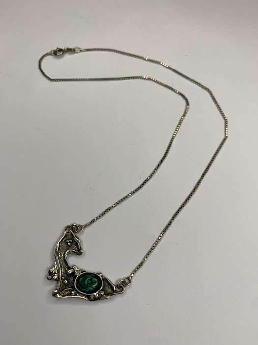 Necklace - 925 Silver Fawn Shaped Pendant on Chain. The pendant has silver bobbles and green ston...