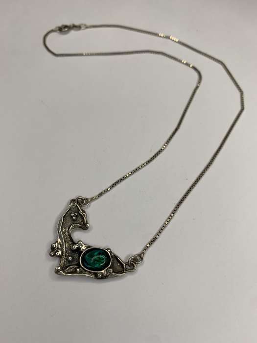 Necklace - 925 Silver Fawn Shaped Pendant on Chain. The pendant has silver bobbles and green ston...