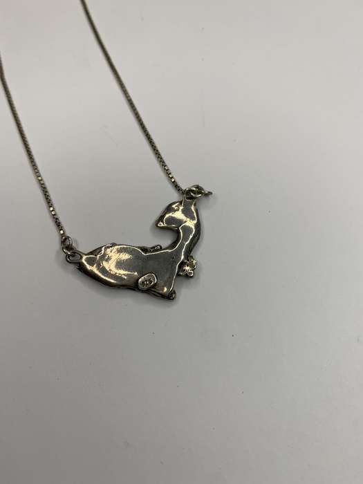 Necklace - 925 Silver Fawn Shaped Pendant on Chain. The pendant has silver bobbles and green ston...