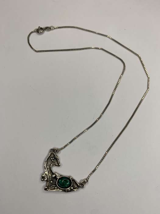Necklace - 925 Silver Fawn Shaped Pendant on Chain. The pendant has silver bobbles and green ston...