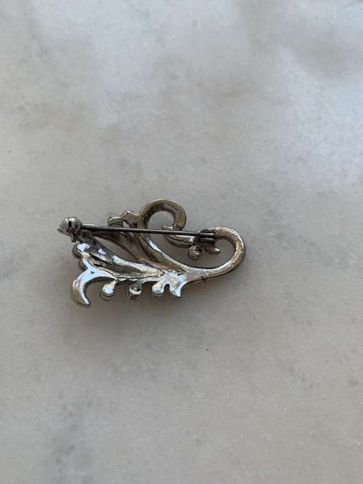 Silver Toned Marcasite Brooch With Flower Pattern #ML804  Dimensions: 44mm x 24mm