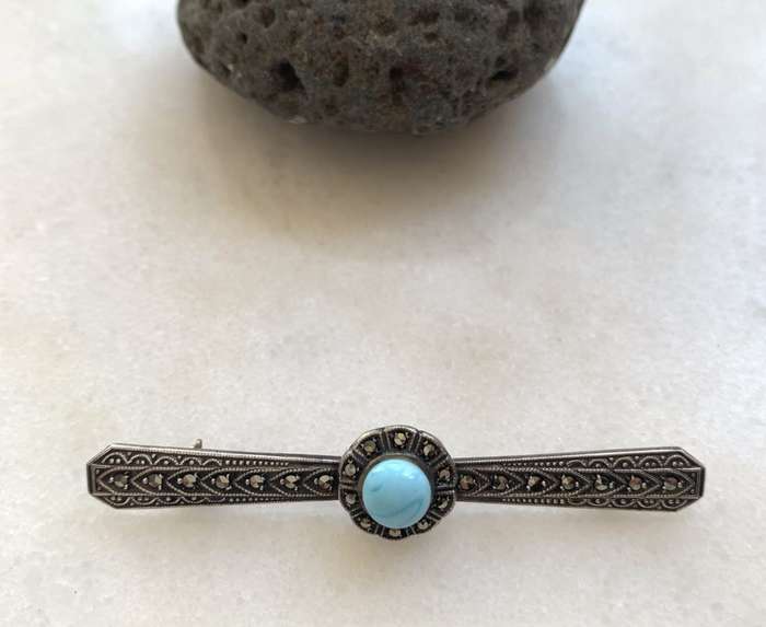 Silver Marcasite Brooch With Light Blue Stone Set In Flower In Centre #ML807 R395.00 | Dimensions...