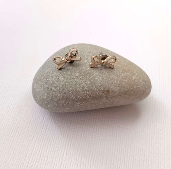 Earrings - Bow Studs. Rose Gold and White Colour #ML1011 R180.00 | Dimensions: 10mm x 5mm