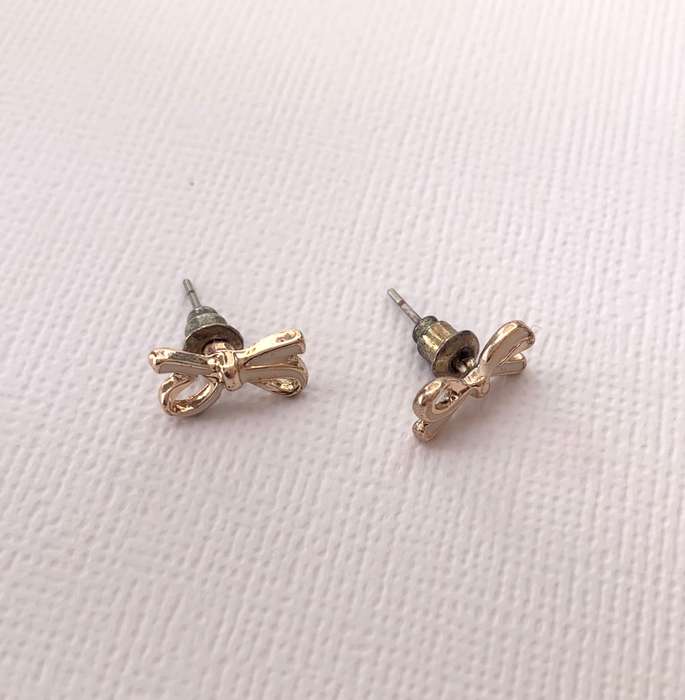 Earrings - Bow Studs. Rose Gold and White Colour #ML1011 R180.00 | Dimensions: 10mm x 5mm