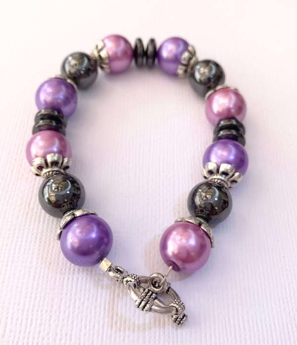 Bracelet - Pink, Purple, Black Beads With Silver Fittings On Wire With Silver Colour Clasp. Bit o...