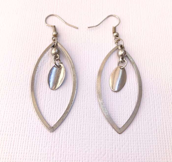 Earrings - Eye Shaped Cut Out Earrings With Dangling Oval. Silver Colour #ML1025 R195.00 | Dimens...