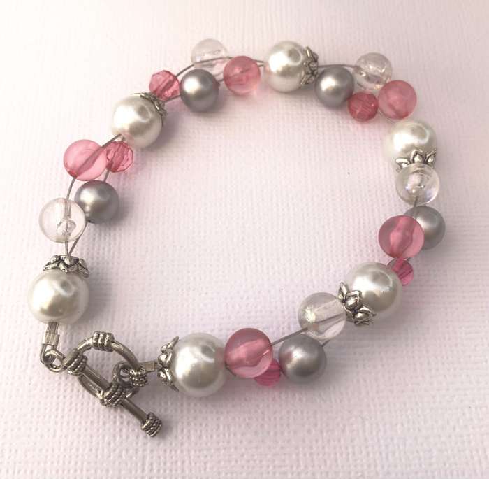 Necklace & Bracelet Set - Round Pink, White and Silver Studded Beads #ML1029 R220.00 | Dimensions...