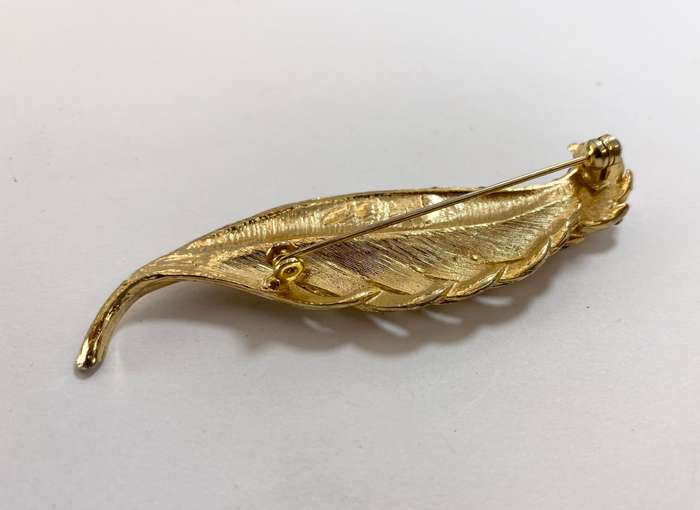 Brooch - Leaf Brooch With Diamante, Gold Coloured #ML1198 R295.00 | Dimensions: 80mm x 22mm