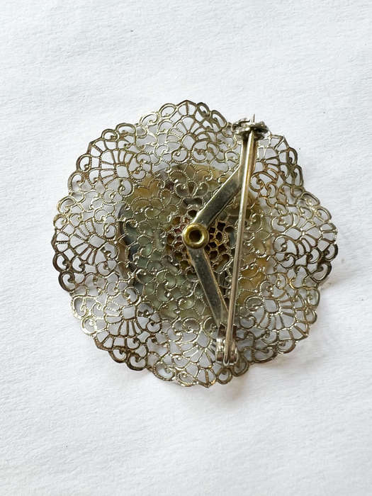 Brooch- Dainty Filigree Silver Tone Design with Mother of Pearl Centre ML1762