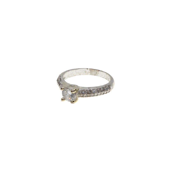 Ring - Silver Tone Band. Solitaire Style Centre Stone surrounded by small Diamantes - ML2972