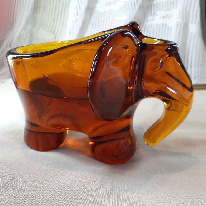 Glass Elephant figurine ashtray - heavy amber glass