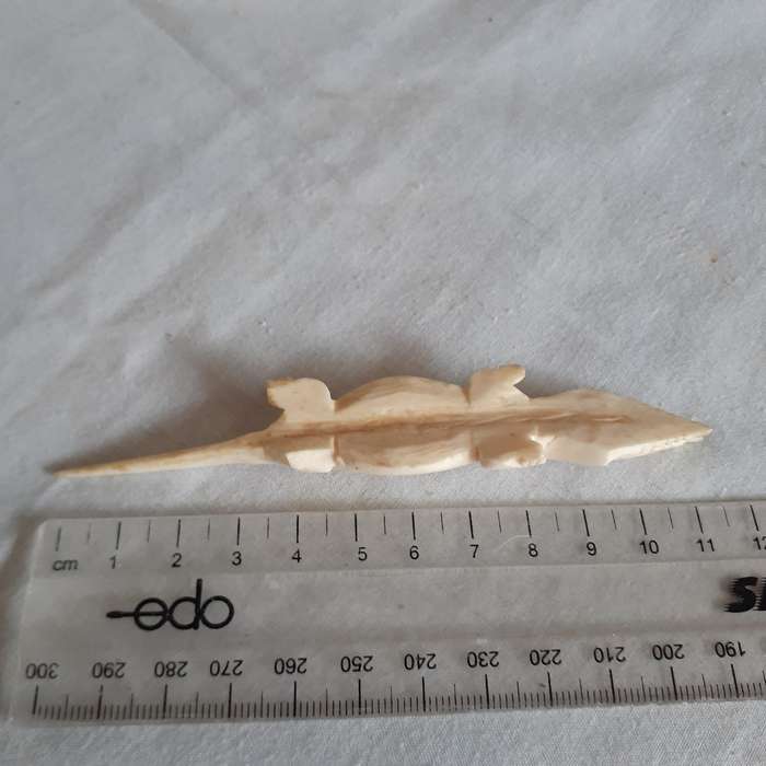 7 little carved bone figurines birds and a crocodile