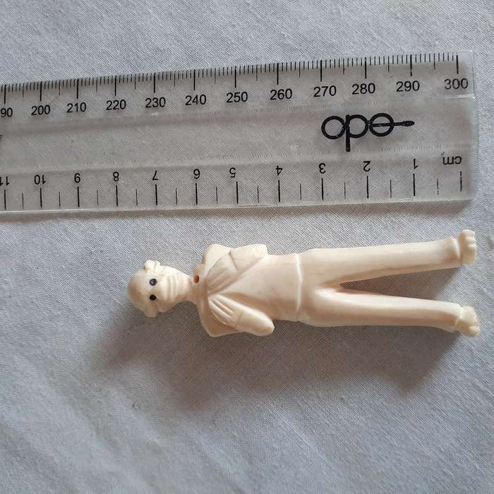 7 little carved bone figurines birds and a crocodile