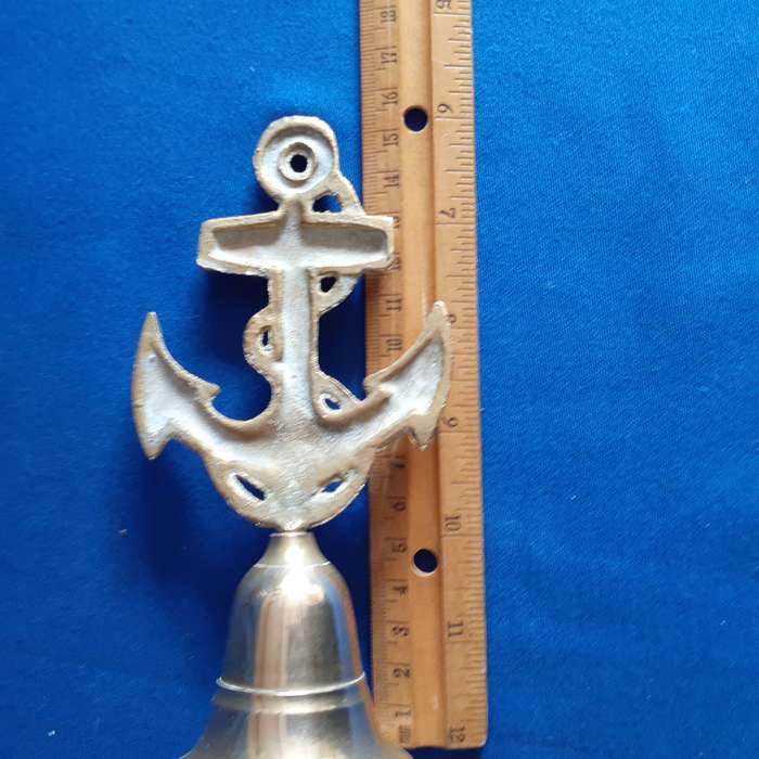 Brass bell with cast ship anchor on top - 15 cms tall  great pub decor