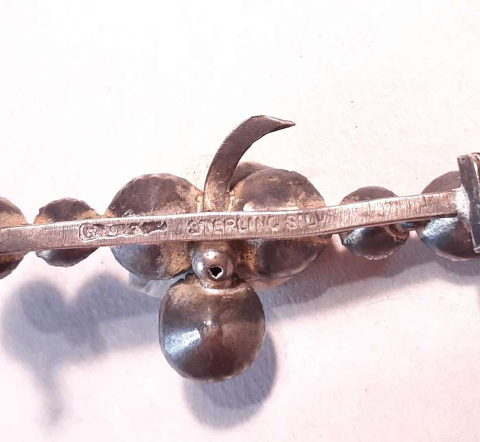 G L and Co stirling silver and diamante brooch