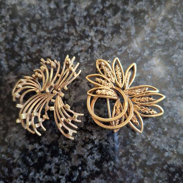 2 gold metal brooches stamped "double" and another indistinct mark.