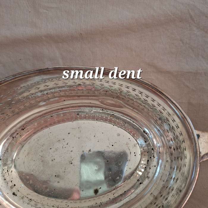 Silver plated fruit dish with two handles.   Walker and Hall.