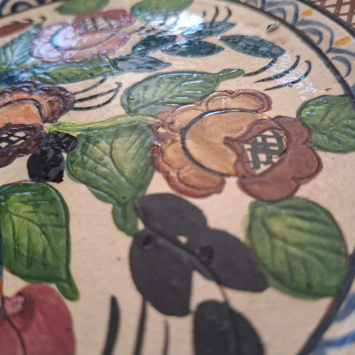 Hand decorated Portugese terra cotta Plate signed - flowers and leaves