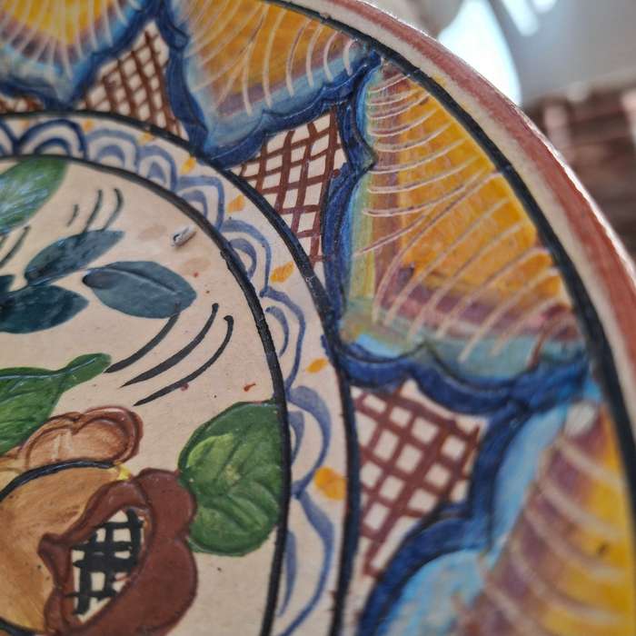 Hand decorated Portugese terra cotta Plate signed - flowers and leaves