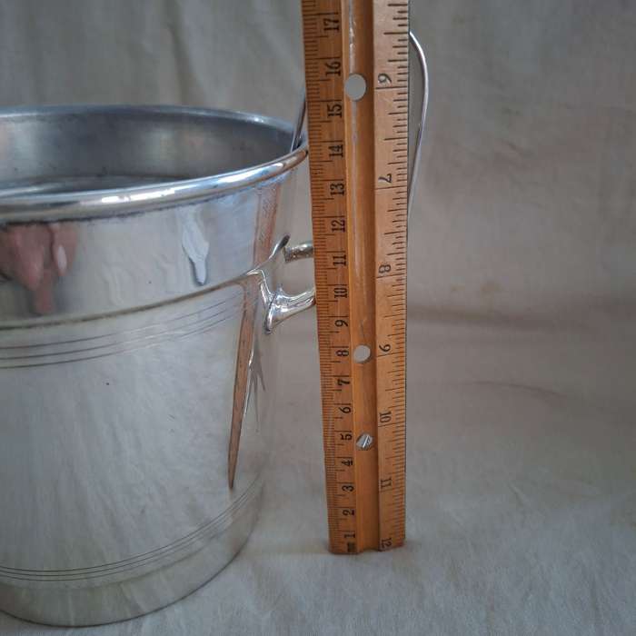Silver plate ice bucket with tongs.   Quality Louis Silver plate with ice water drainer