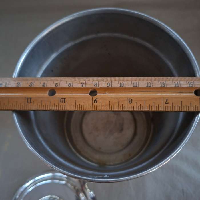 Silver plate ice bucket with tongs.   Quality Louis Silver plate with ice water drainer