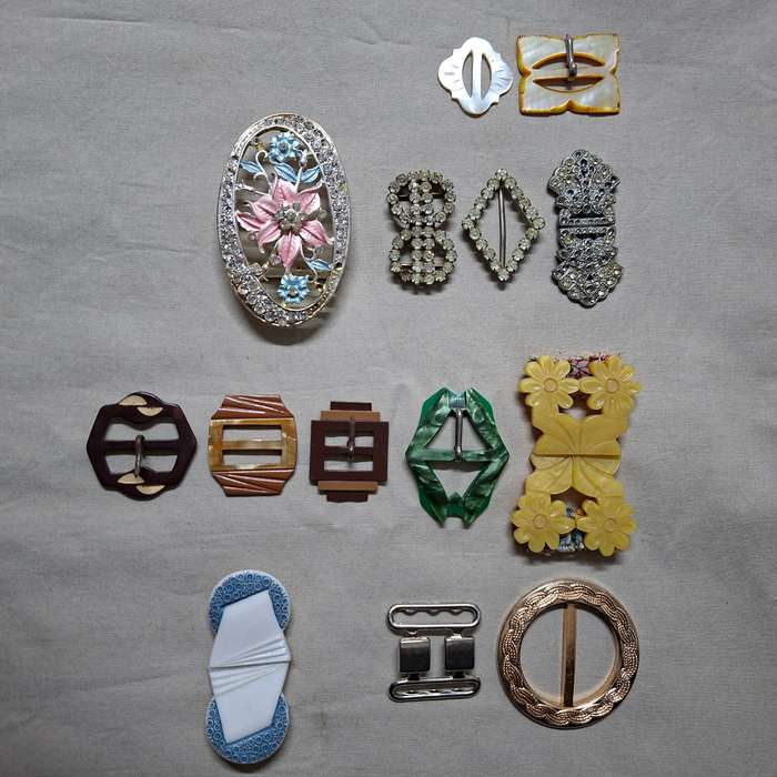 14 Vintage belt buckles - mother of pearl, glass, bakelite, and metal in vintage tin