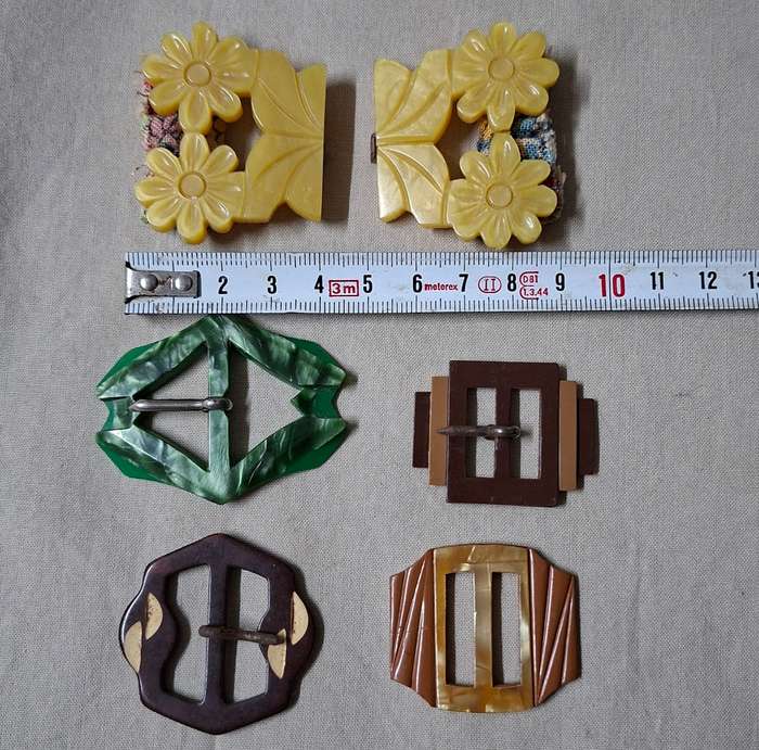 14 Vintage belt buckles - mother of pearl, glass, bakelite, and metal in vintage tin