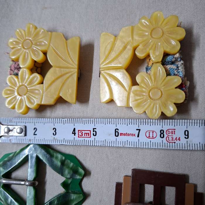 14 Vintage belt buckles - mother of pearl, glass, bakelite, and metal in vintage tin