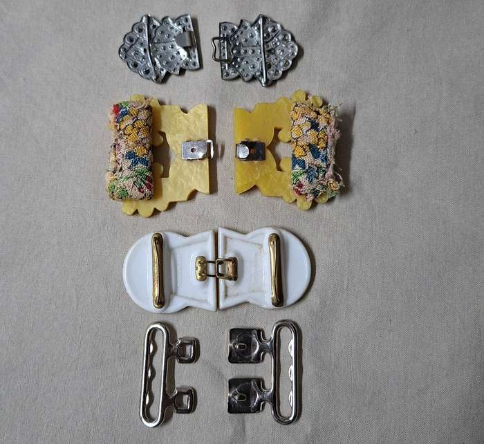 14 Vintage belt buckles - mother of pearl, glass, bakelite, and metal in vintage tin