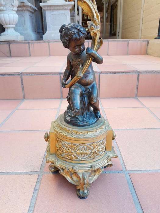 A 19TH Century Large Size Pair of French Louis VI Gilt Bronze Putti Candelabras