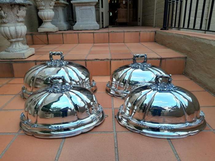 An Antique Victorian Set of Four Silver Plated Graduated Food Domes