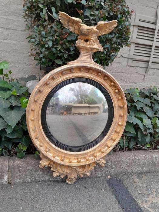 An  English Antique 19th Century Circa 1830s Regency Convex Mirror with Eagle and Ball Detail