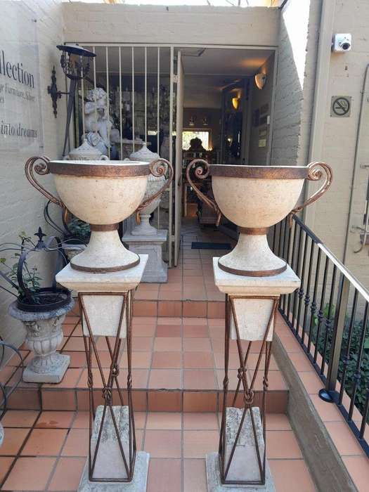 A 20th Century Decorative Pair Of Metal And Stone Urns On Stands