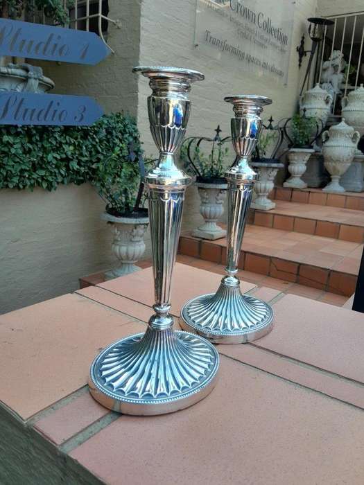 An Early 19th Century Pair of George III Old Sheffield Plated Candlesticks On Loaded Bases